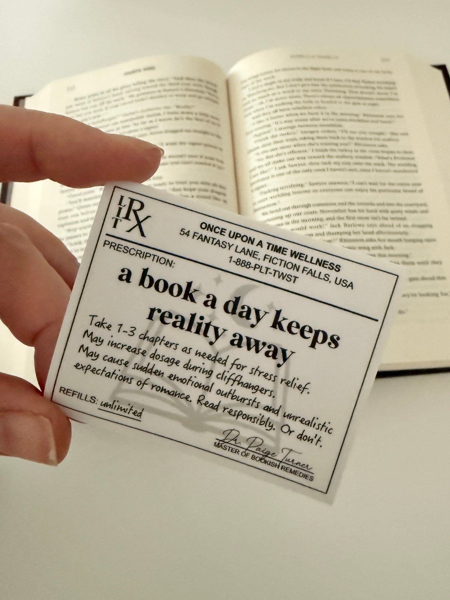 A Book A Day Keeps Reality Away Sticker