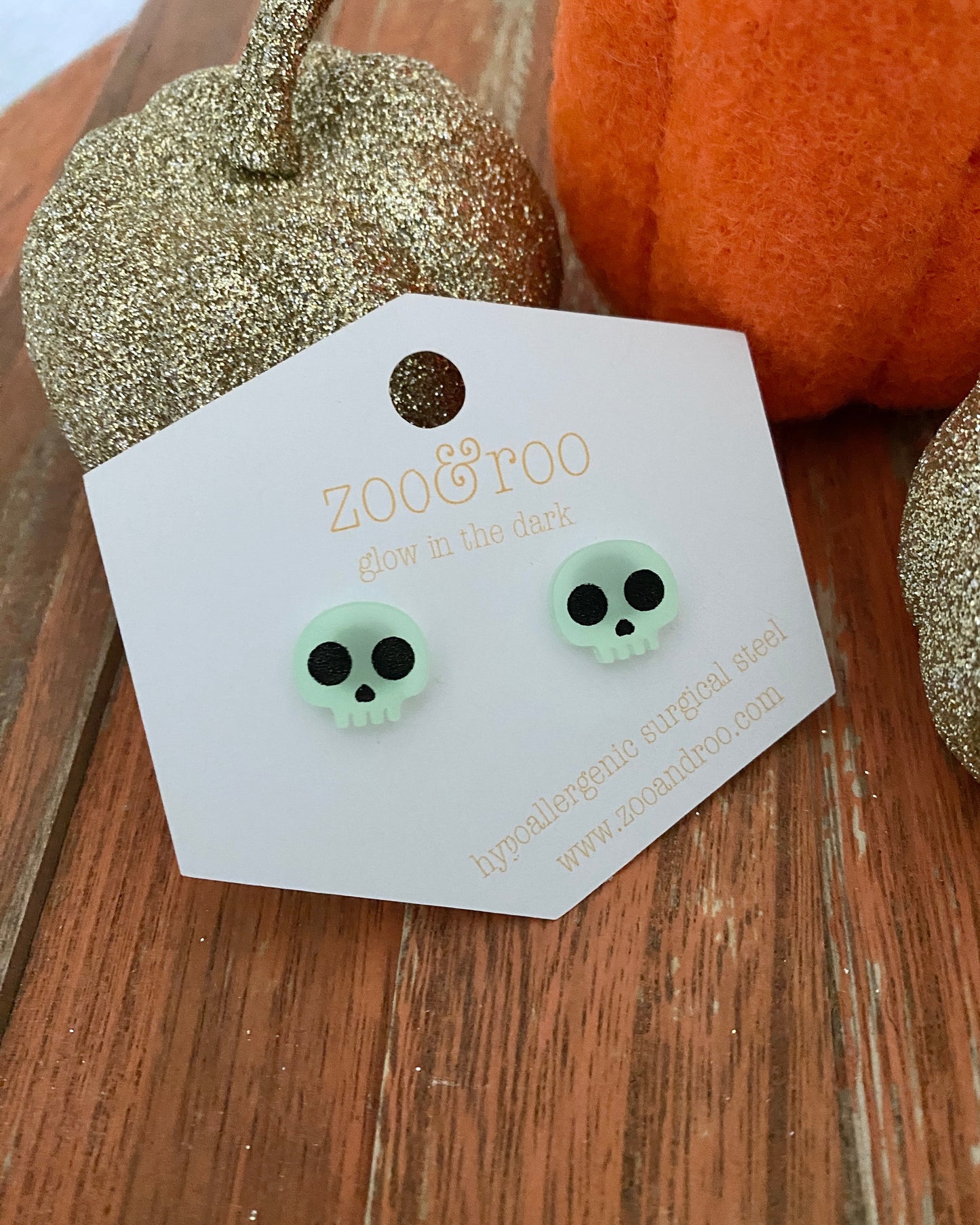 Glow in the dark skull studs