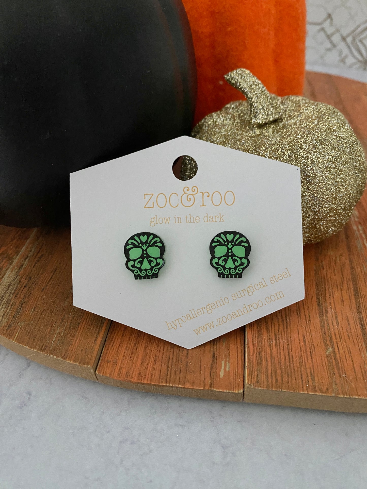 Glow in the dark sugar skull studs