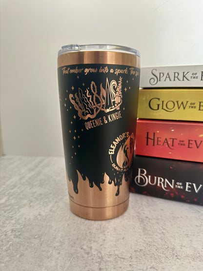 A black and copper Emarion 20 oz tumbler, showing the Queenie & Kingie and Eleanor's Embers designs from Burn of the Everflame by Penn Cole