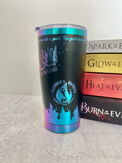 A black and copper Emarion 20 oz tumbler, showing the Queenie & Kingie and Eleanor's Embers designs from Burn of the Everflame by Penn Cole