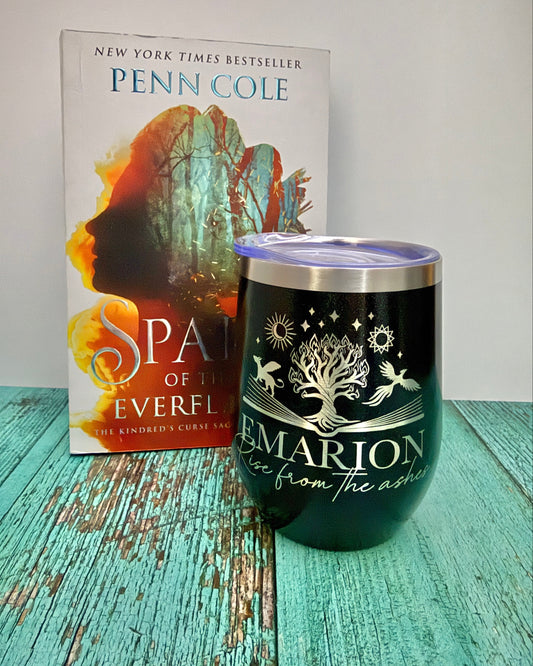 black wine tumbler with Emarion, rise from the ashes engraved on it along with the Everflame tree from The Kindred's Curse Saga
