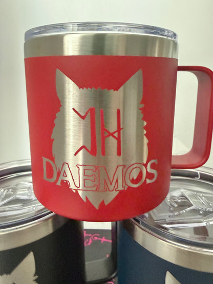 Red camp mug with a wolf design and 'DAEMOS' text on a white background