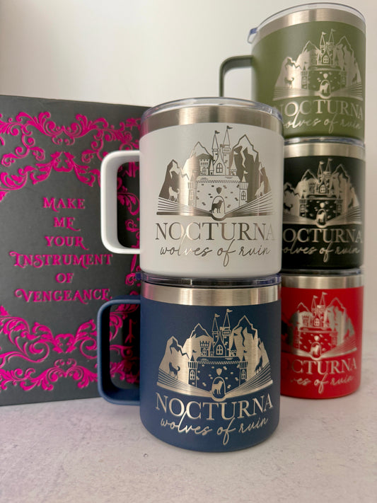 Four insulated mugs with 'Nocturna' wolves of ruin and castle design on a white surface with Dire Bound book in background.
