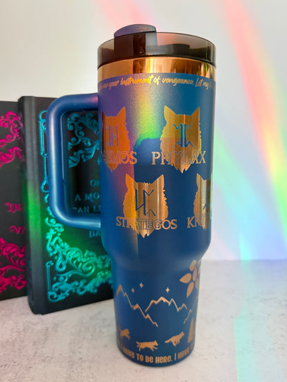 Blue 40 oz Dire Bound inspired tumbler with gold-engraved wolf pack symbols for Daemos, Strategos, Phylax and Kryptos