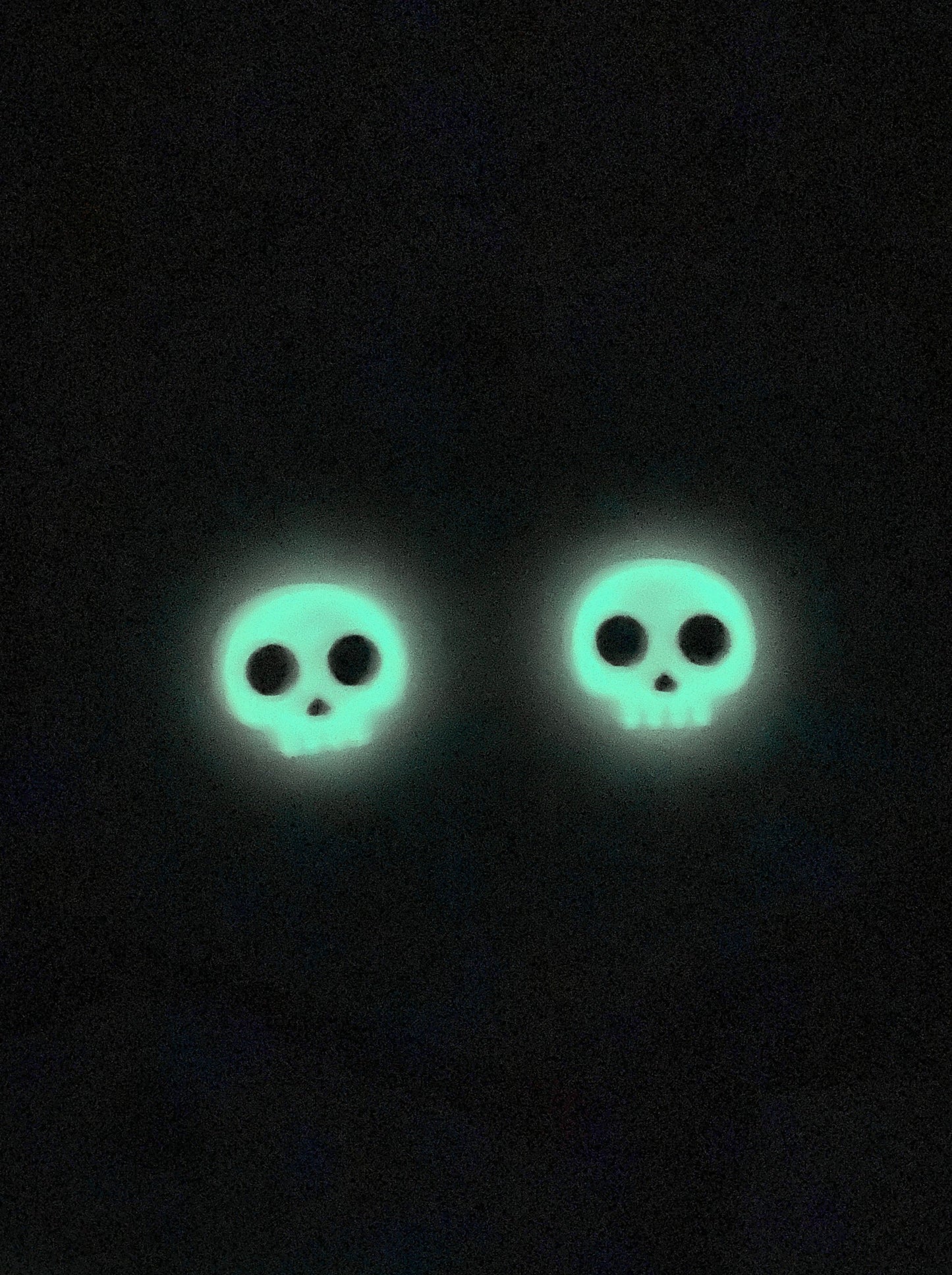 Glow in the dark skull studs