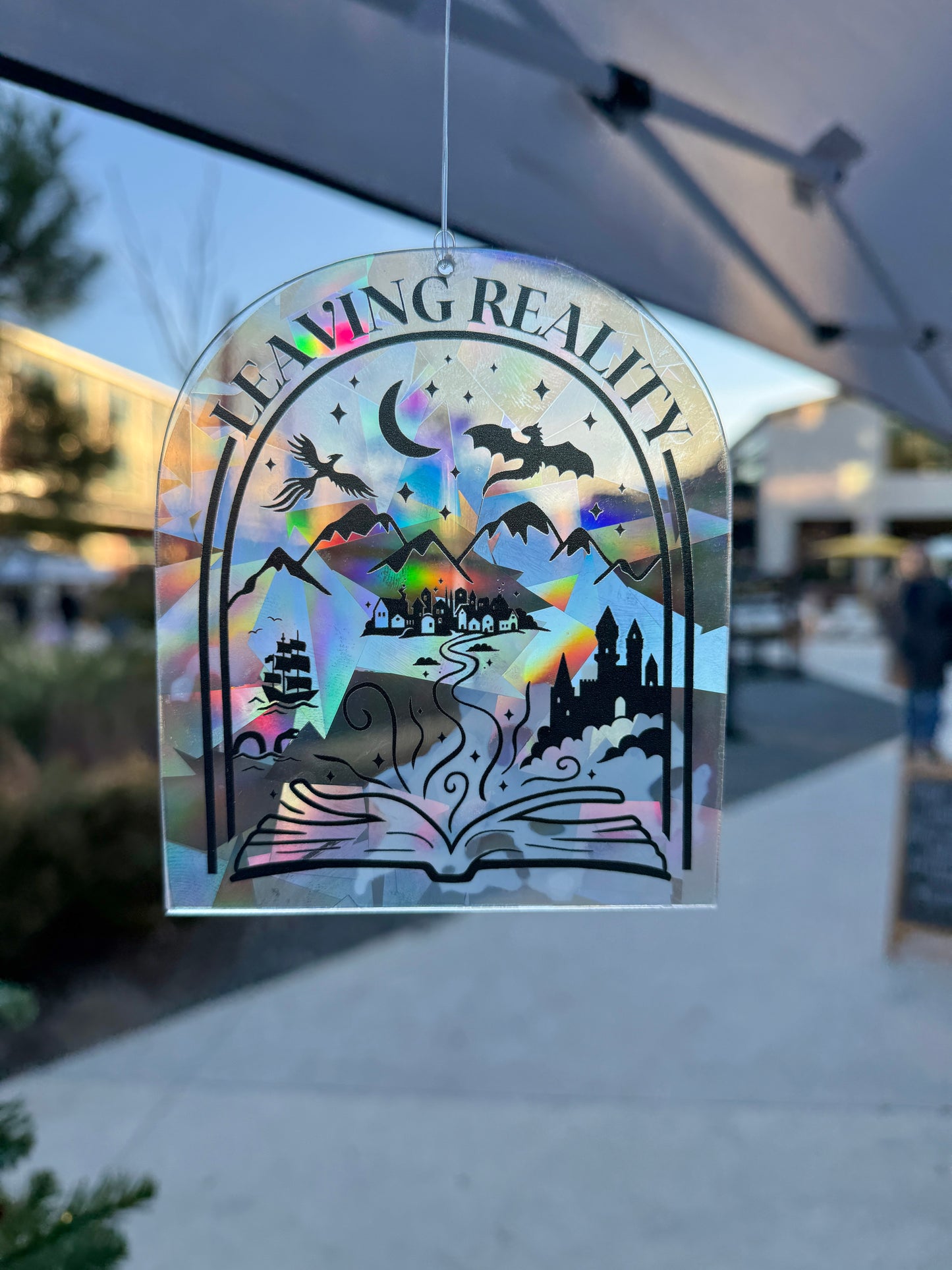 Leaving reality suncatcher decal