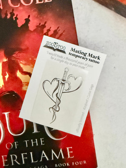 Two hearts forged into a dagger - the mating mark temporary tattoo resting on the cover of Burn of the Everflame by Penn Cole