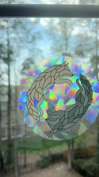 Video of a holographic wolf decal on a window
