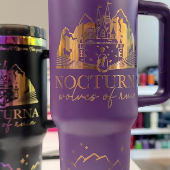 Purple 40 oz Dire Bound inspired tumbler with a gold-engraved Nocturna castle, mountains, and wolves
