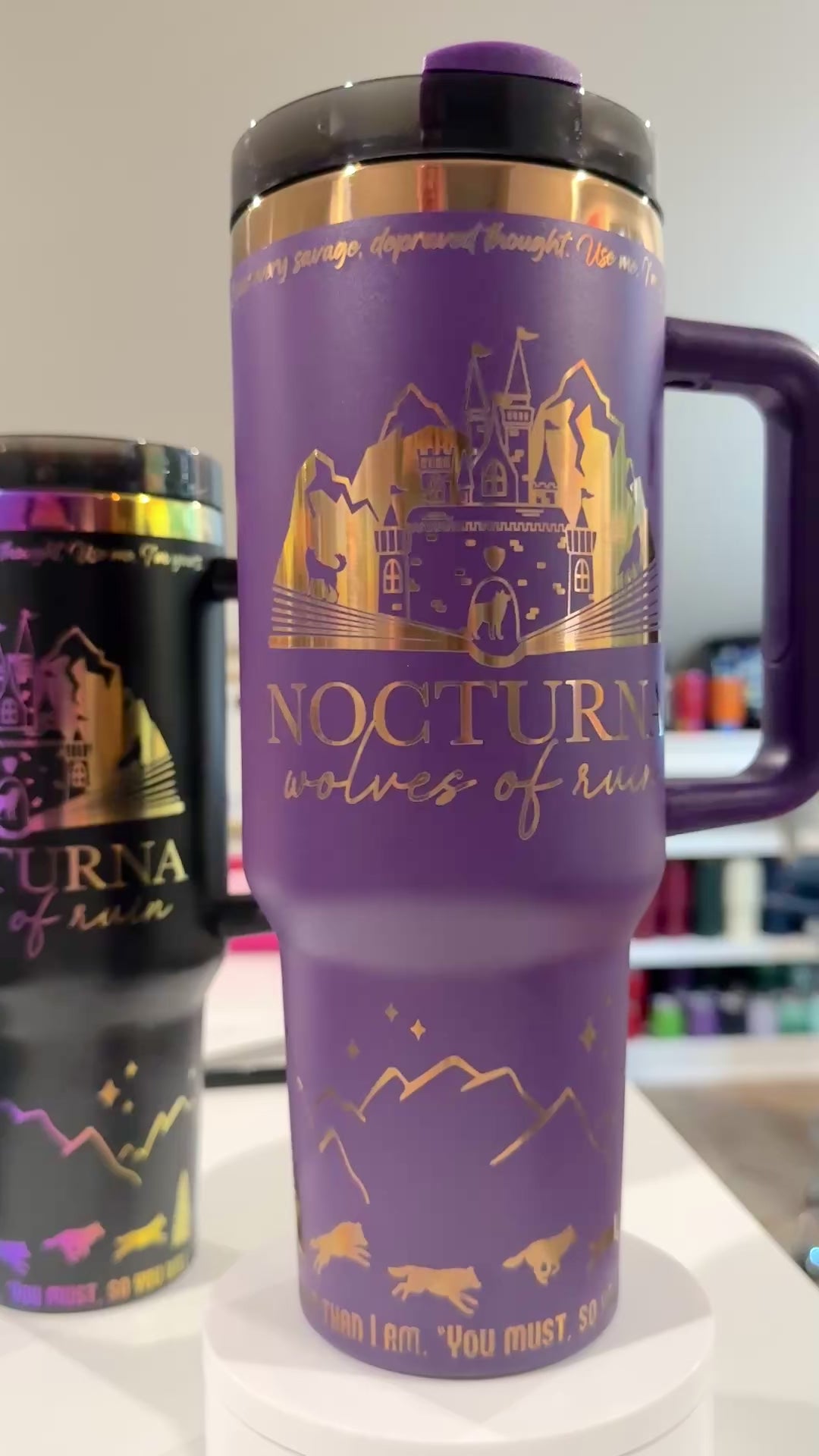 Purple 40 oz Dire Bound inspired tumbler with a gold-engraved Nocturna castle, mountains, and wolves