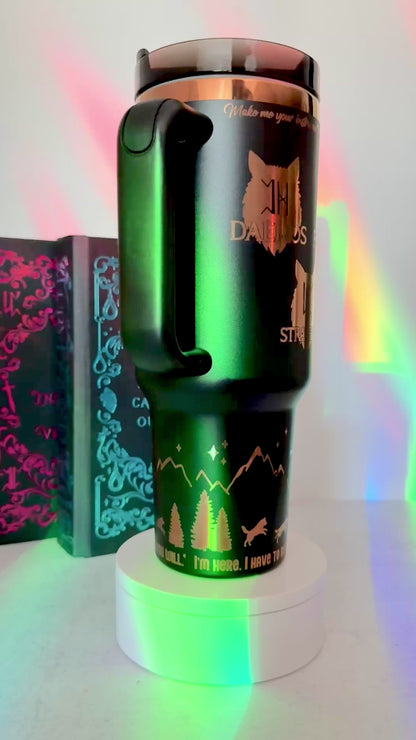 Black 40 oz Dire Bound inspired tumbler with a gold-engraved Nocturna castle, mountains, wolves and pack symbols Daemos, Strategos, Phylax and Kryptos