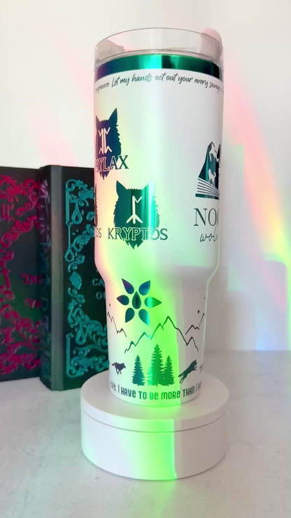 White 40 oz Dire Bound inspired tumbler with rainbow-engraved Nocturna castle, mountains, wolves and wolf pack symbols for Daemos, Strategos, Phylax and Kryptos