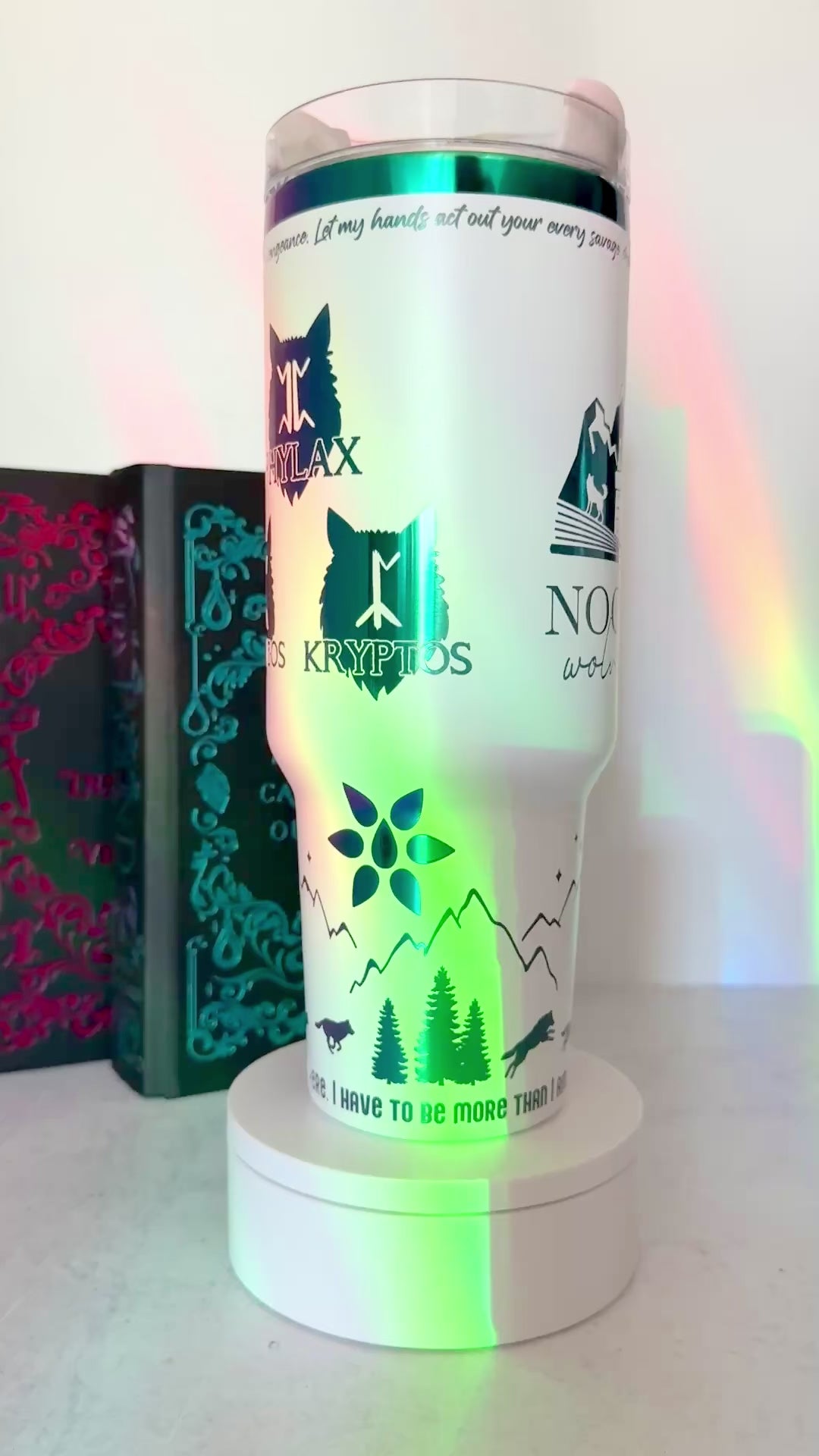 White 40 oz Dire Bound inspired tumbler with rainbow-engraved Nocturna castle, mountains, wolves and wolf pack symbols for Daemos, Strategos, Phylax and Kryptos